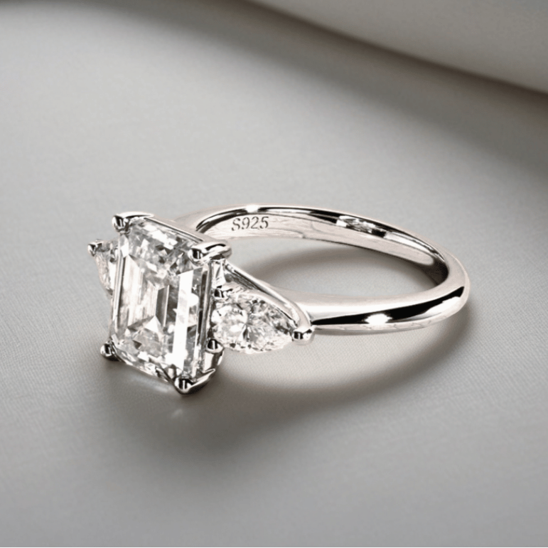 4ct Emerald-Cut Moissanite Engagement Ring | 0.5 Carat Pear-Cut Side Stones